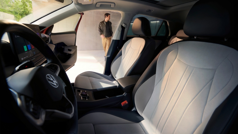 TC1296_interior_view_on_seats_with_man_standing_outside